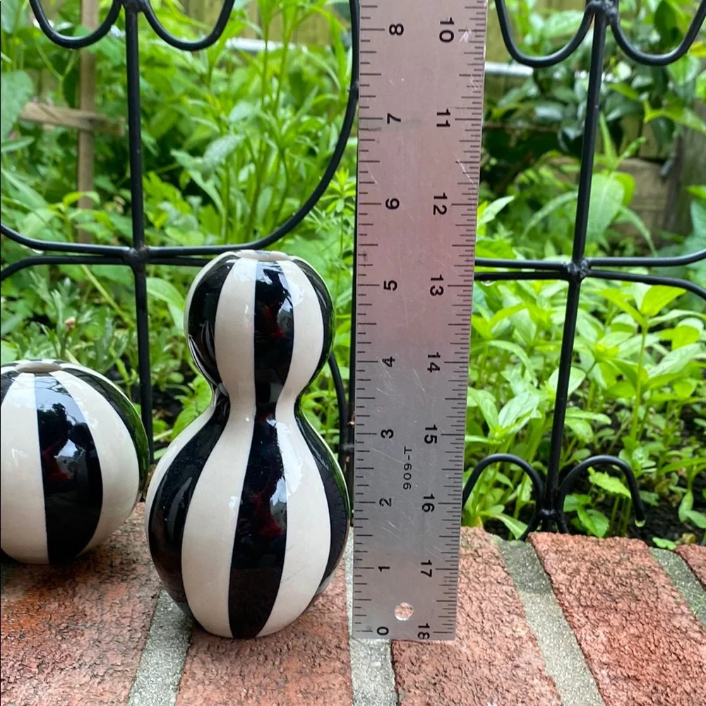 Set of three Jonathan Adler Black and White Striped Vases. Circa 1990s.